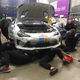 Working in the garage during the race weekend.